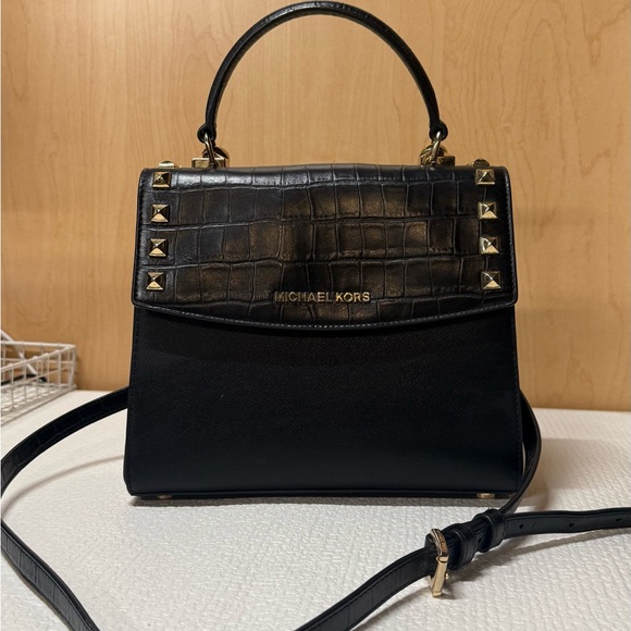 Michael Kors Handbags - Michael Kors Black and Gold‎ Crossbody Bag with Elegant Design